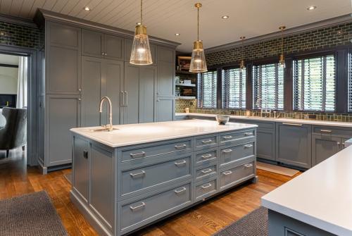 The Phoenix House Light blue grey kitchen with island.