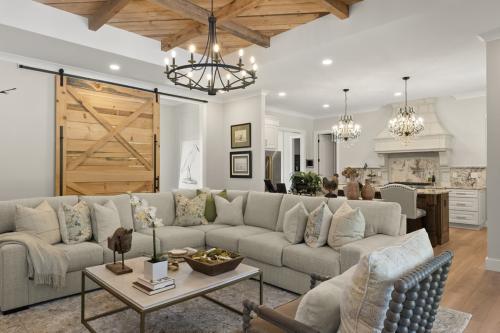 Benton Farms living room with sliding farm door.