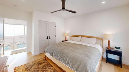 Flat Top Mountain house white bedroom.