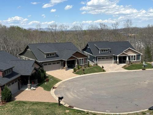 Pinnacle at Arabella drone view of exterior and road.
