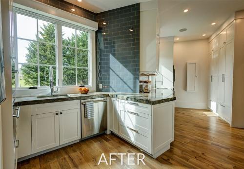After pantry home remodel. Blue tile in a luxurious space butlers kitchen. White Cabinets and dish washer. 