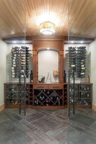 Wine cellar with glass door.