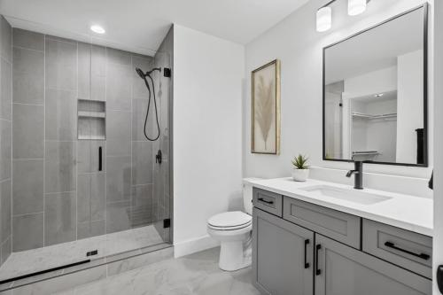 Laurelwood Village Townhomes gray and white bathroom.