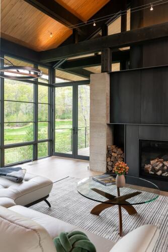 Walnut Valley modern fireplace and couch.