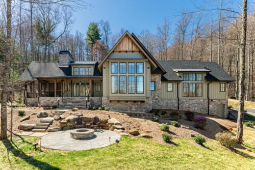 Secluded Sanctuary exterior back with firepit.